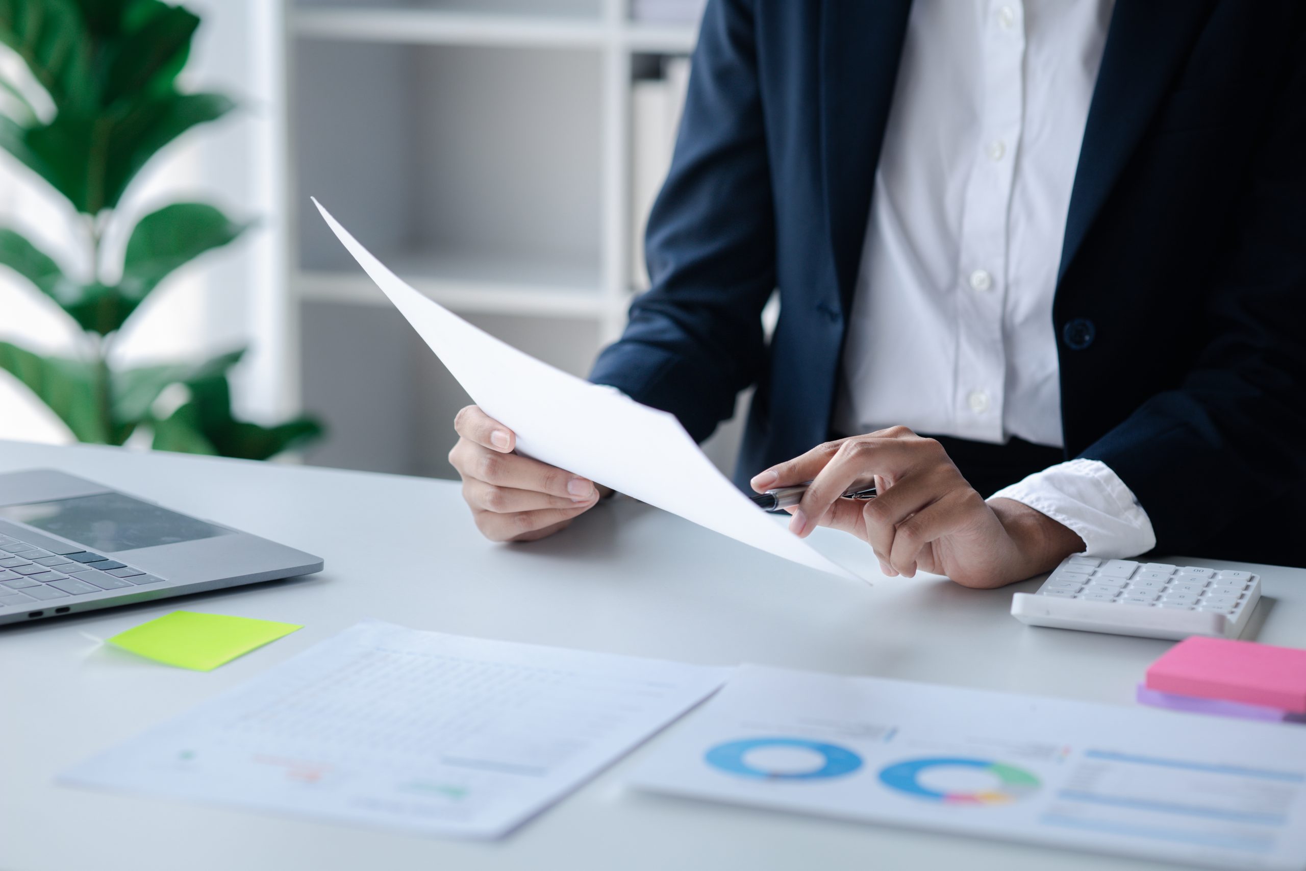 a-female-financier-is-reviewing-company-financial-2023-11-27-05-29-55-utc