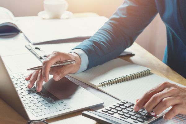 Tax Planning for Small Business An image showing tax planning for a small business owner