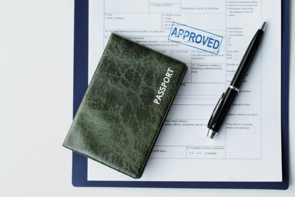 documents-for-making-visa-flat-lay-2023-11-27-05-15-01-utc-scaled