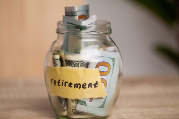 glass-jar-with-dollars-save-money-for-a-retiremen-2023-11-27-04-49-26-utc-1-scaled